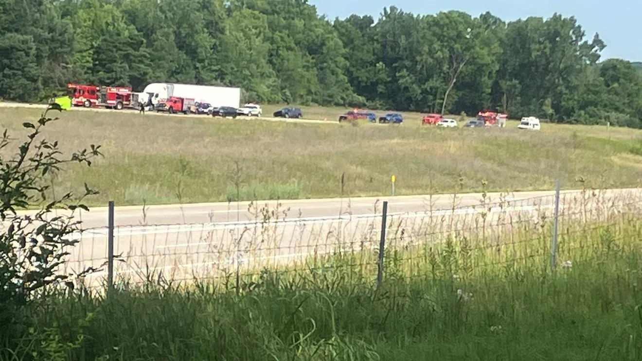 Police investigate a fatal three-vehicle crash scene on southbound US-131