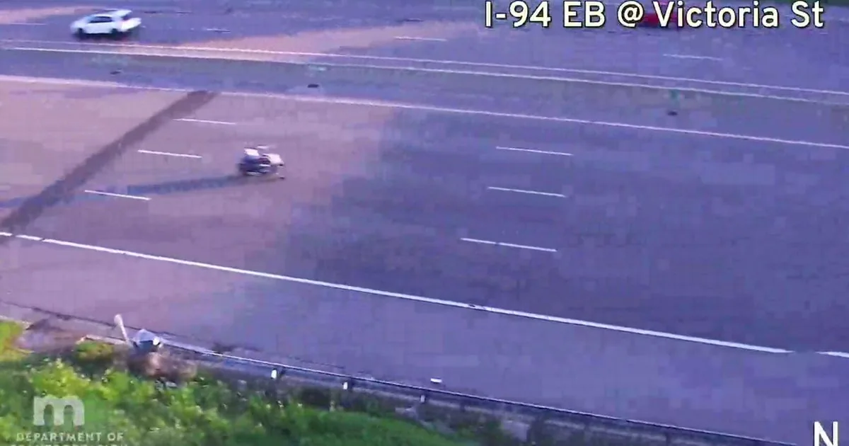 Police lights at a crash scene after a motorcycle pursuit in the Twin Cities